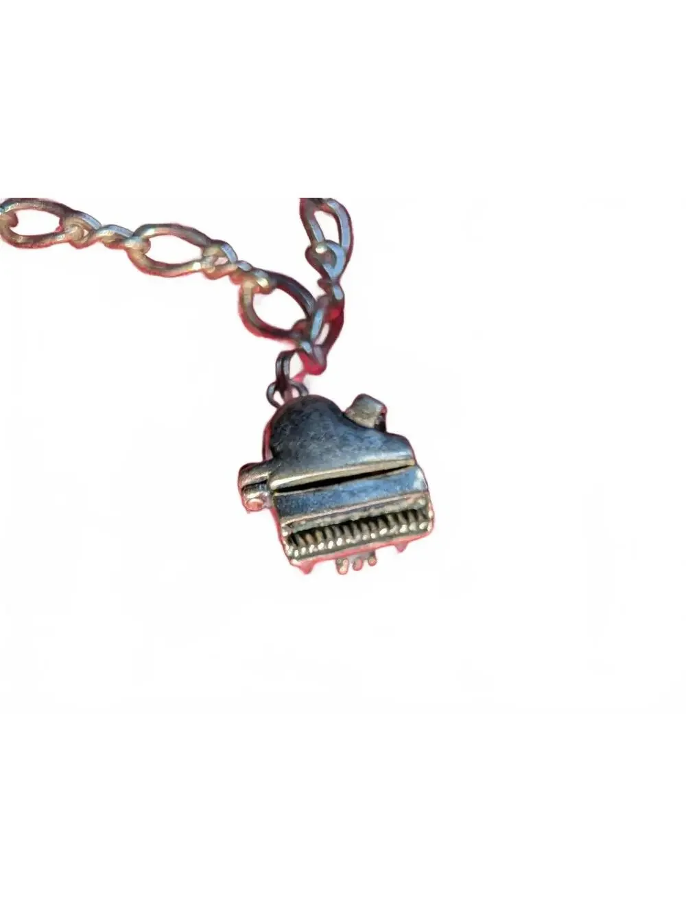 Sterling Silver Piano Charm Bracelet with Heart Locket